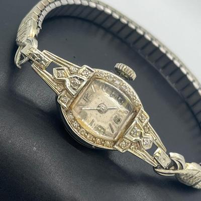 LOT 121: 14K Solid White Gold Ladies Watch (Not Working) w/ Diamonds on Speidel Stretch Band