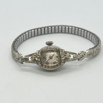 LOT 121: 14K Solid White Gold Ladies Watch (Not Working) w/ Diamonds on Speidel Stretch Band