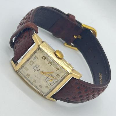 LOT 122: Vintage Elgin DeLuxe Men's Watch w/ 10K Gold Filled Bezel and Leather Band - Winds and Ticks