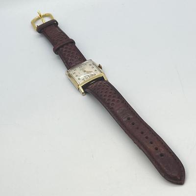 LOT 122: Vintage Elgin DeLuxe Men's Watch w/ 10K Gold Filled Bezel and Leather Band - Winds and Ticks