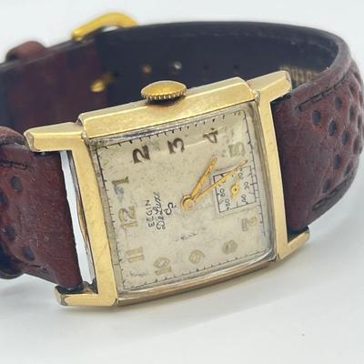 LOT 122: Vintage Elgin DeLuxe Men's Watch w/ 10K Gold Filled Bezel and Leather Band - Winds and Ticks