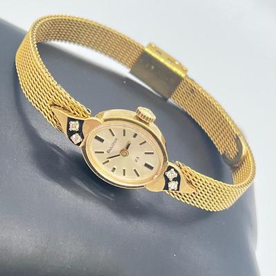 LOT 12: 14K Gold Bulova Ladies Watch w/ Diamonds on Gold Filled Band - Winds and Ticks