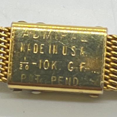 LOT 12: 14K Gold Bulova Ladies Watch w/ Diamonds on Gold Filled Band - Winds and Ticks