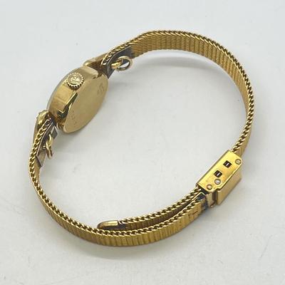 LOT 12: 14K Gold Bulova Ladies Watch w/ Diamonds on Gold Filled Band - Winds and Ticks
