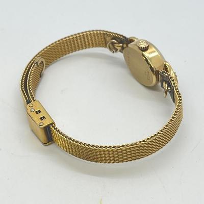 LOT 12: 14K Gold Bulova Ladies Watch w/ Diamonds on Gold Filled Band - Winds and Ticks