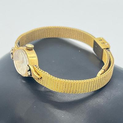 LOT 12: 14K Gold Bulova Ladies Watch w/ Diamonds on Gold Filled Band - Winds and Ticks