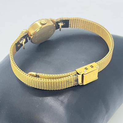 LOT 12: 14K Gold Bulova Ladies Watch w/ Diamonds on Gold Filled Band - Winds and Ticks