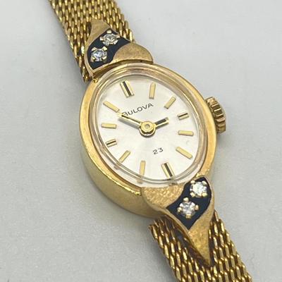 LOT 12: 14K Gold Bulova Ladies Watch w/ Diamonds on Gold Filled Band - Winds and Ticks