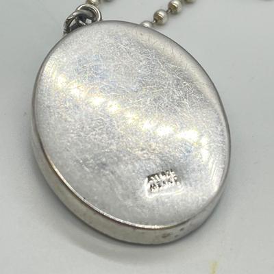 LOT 128: Sterling Silver Religious Pendants and Necklaces - 29.8 gtw