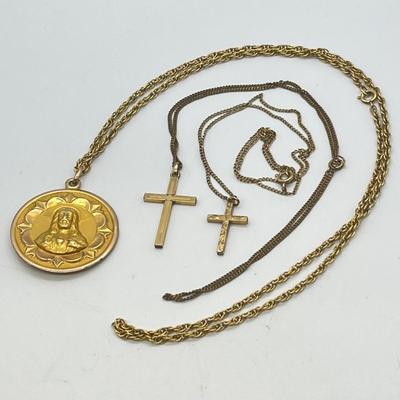 LOT 129: Gold Filled Neckaces w/ Religious Pendants