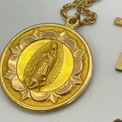 LOT 129: Gold Filled Neckaces w/ Religious Pendants