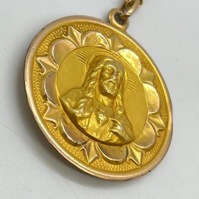 LOT 129: Gold Filled Neckaces w/ Religious Pendants