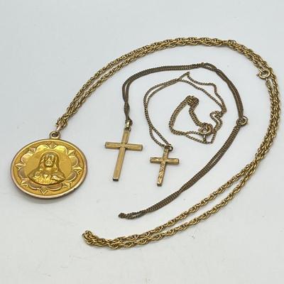 LOT 129: Gold Filled Neckaces w/ Religious Pendants