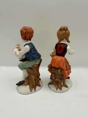 Napcoware Vintage Girl and Boy On Tree Stumps Figurines