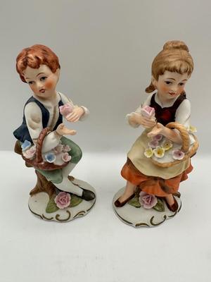 Napcoware Vintage Girl and Boy On Tree Stumps Figurines
