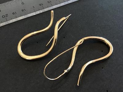 Large Gold Tone Twist Earrings