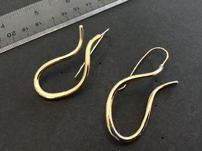 Large Gold Tone Twist Earrings