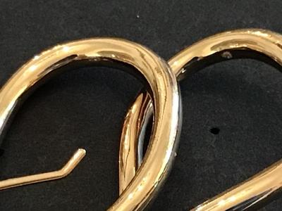 Large Gold Tone Twist Earrings