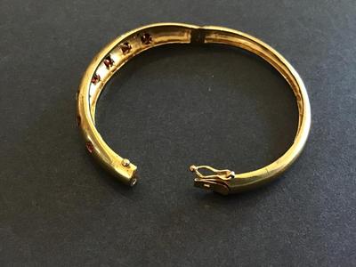 Hinged Locking Ruby Type Stone Colors Gold Tone