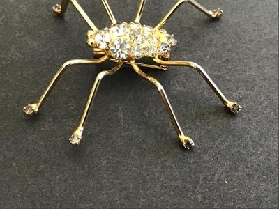 Rhinestone spider with Black Rhinestone Feet Brooch
