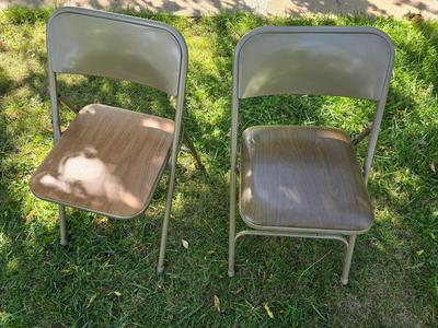 Folding wood grain table with 4 folding chairs