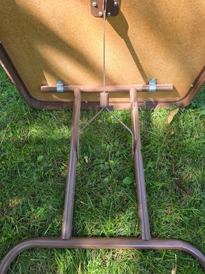 Folding wood grain table with 4 folding chairs