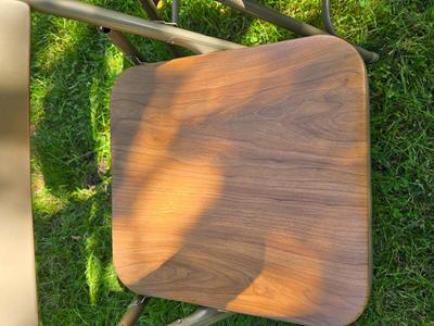 Folding wood grain table with 4 folding chairs