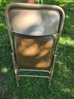 Folding wood grain table with 4 folding chairs