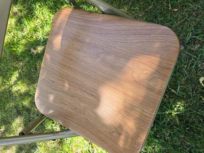 Folding wood grain table with 4 folding chairs