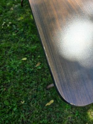Folding wood grain table with 4 folding chairs