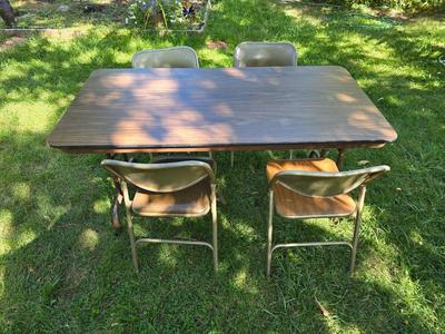 Folding wood grain table with 4 folding chairs