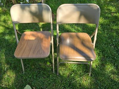 Folding wood grain table with 4 folding chairs