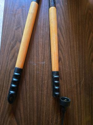 Electric weed eater, Loppers, and a bow saw