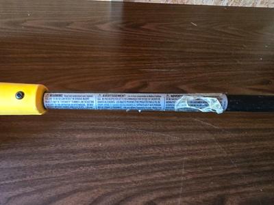 Electric weed eater, Loppers, and a bow saw