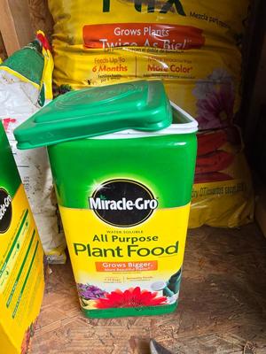 Lawn and Garden supplies and chemicals with a true temper spreader
