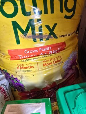 Lawn and Garden supplies and chemicals with a true temper spreader