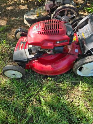 Toro GTS 6.5 lawn mower and Yard Machine 18" String trimming mower