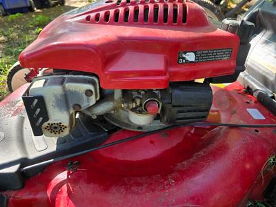 Toro GTS 6.5 lawn mower and Yard Machine 18" String trimming mower