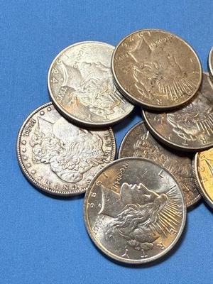BAG #5 OF 10 DECENT SHAPE MORGAN & PEACE SILVER DOLLARS AT MELT SILVER PRICE AS PICTURED. (RECEIVE ALL COINS PICTURED).