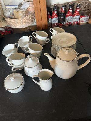 Sale Photo Thumbnail #2518: 12 tea saucers 12 coffee cups teapot cream & sugar