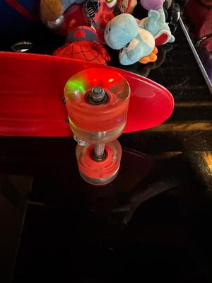 PLUSH TOYS AND A LIGHT UP SKATEBOARD