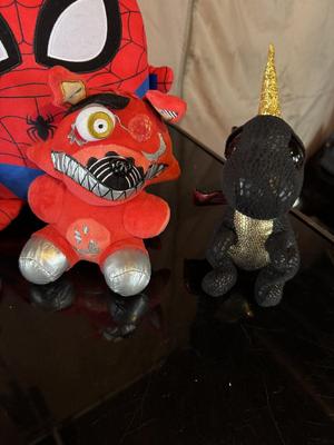 PLUSH TOYS AND A LIGHT UP SKATEBOARD