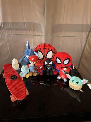 PLUSH TOYS AND A LIGHT UP SKATEBOARD