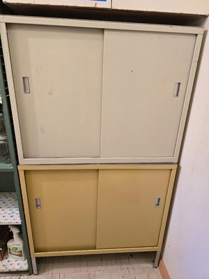 Two vintage metal base cabinet storage with sliding doors