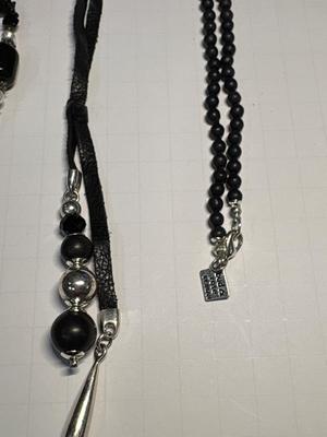 4 black-tone necklaces
