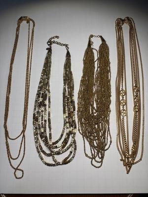 4 gold necklaces