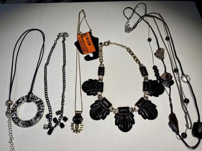 5 black necklaces