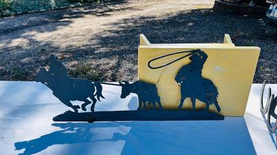 HORSESHOE COAT HOOKS AND A COWBOY IRON WALL CUTOUT
