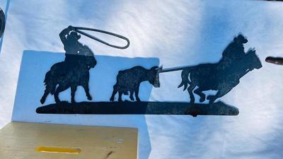 HORSESHOE COAT HOOKS AND A COWBOY IRON WALL CUTOUT