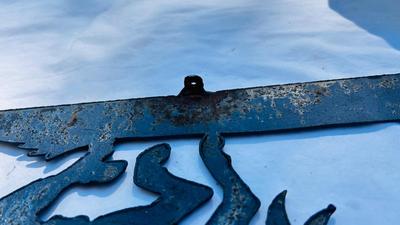 HORSESHOE COAT HOOKS AND A COWBOY IRON WALL CUTOUT